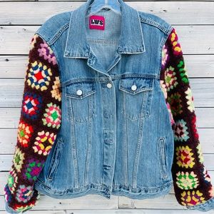 Custom refashioned denim jacket with vintage crocheted sleeves.